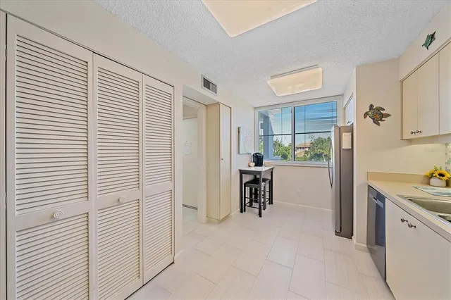 a view of a room that has a bench in it