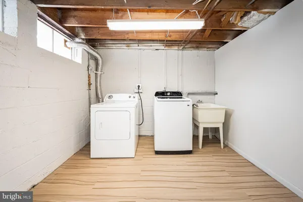 a bathroom with a shower and a toilet