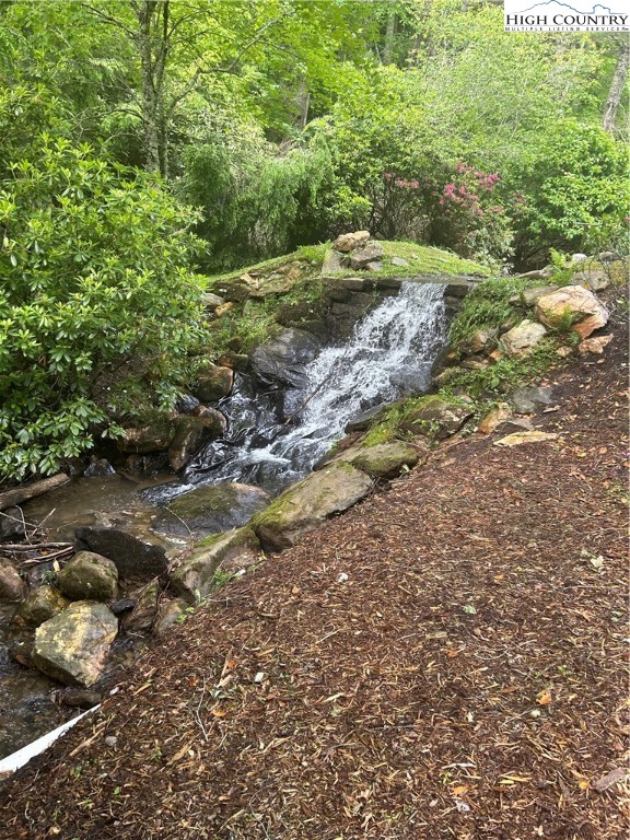 Rainbow Ridge Road Zionville, NC 28698 - Photo 3 of 8 a view of a tree with a yard