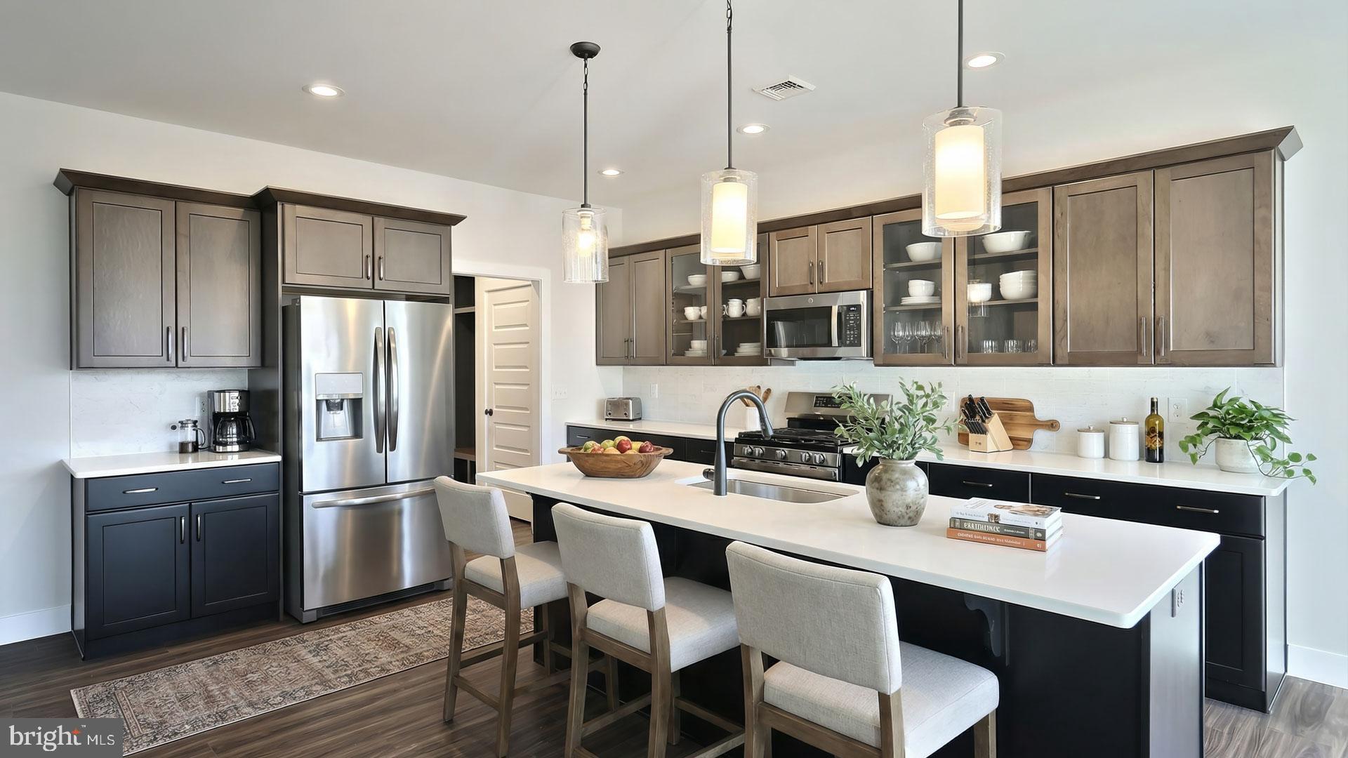475 Pinnacle Rdg Drive Annville, PA 17003 - Photo 3 of 31 a kitchen with stainless steel appliances a sink a stove a refrigerator a center island and chairs