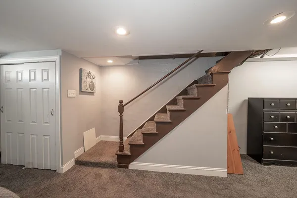 a view of a hallway with windows
