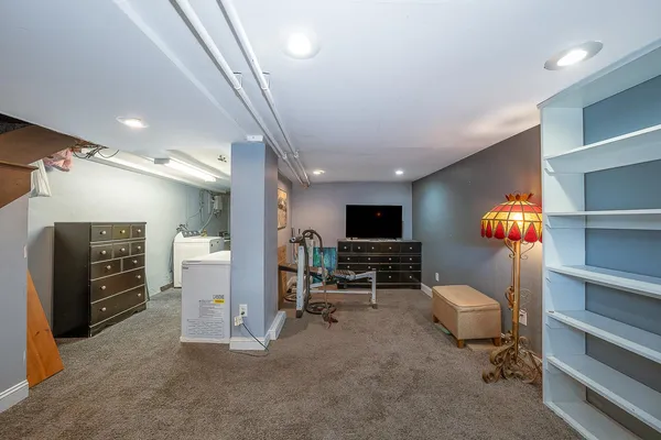 a room with furniture and a flat screen tv