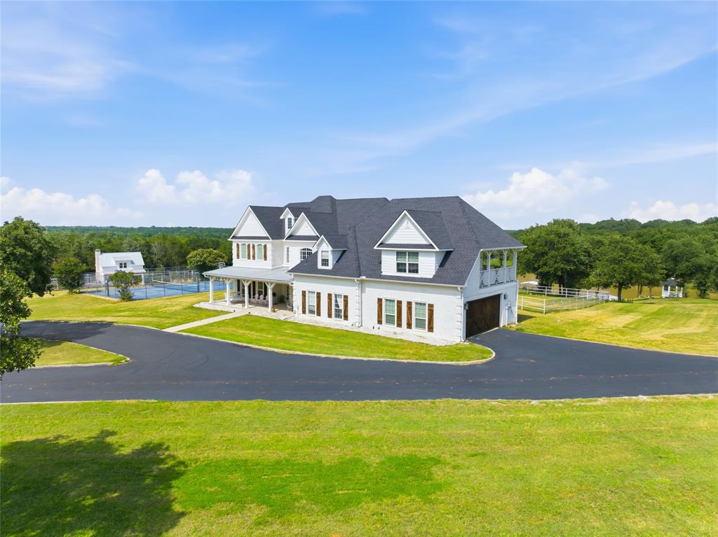 1073 Gordonville Road Gordonville, TX 76245 - Photo 6 of 38 A picture perfect homesite awaits you as you round the corner on the paved driveway.