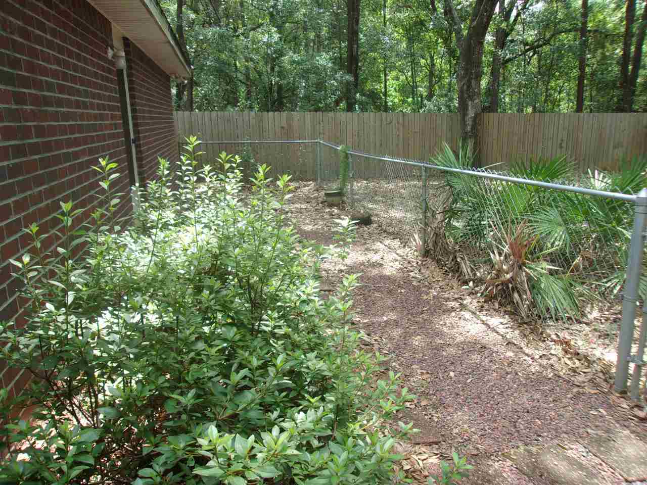 2563 Santa Rosa Drive Lillian, AL 36549 - Photo 39 of 43 Dog fenced area