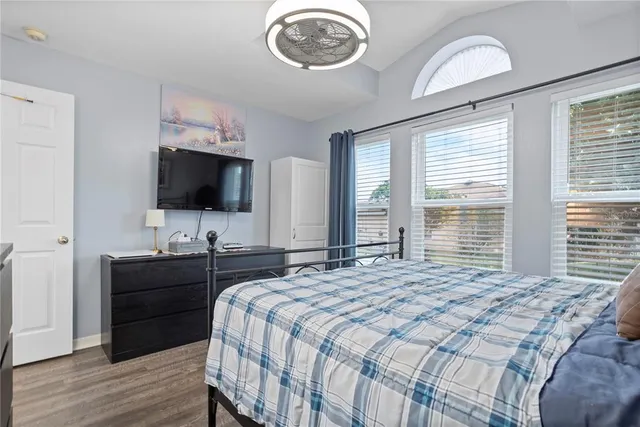 a bathroom with a toilet and shower