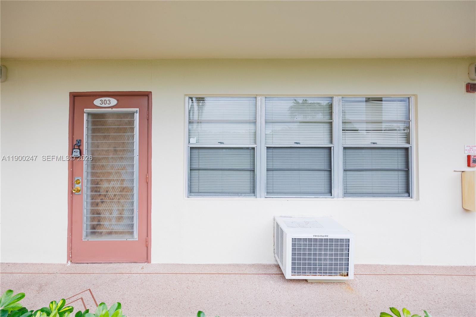 a room with cabinets and a window