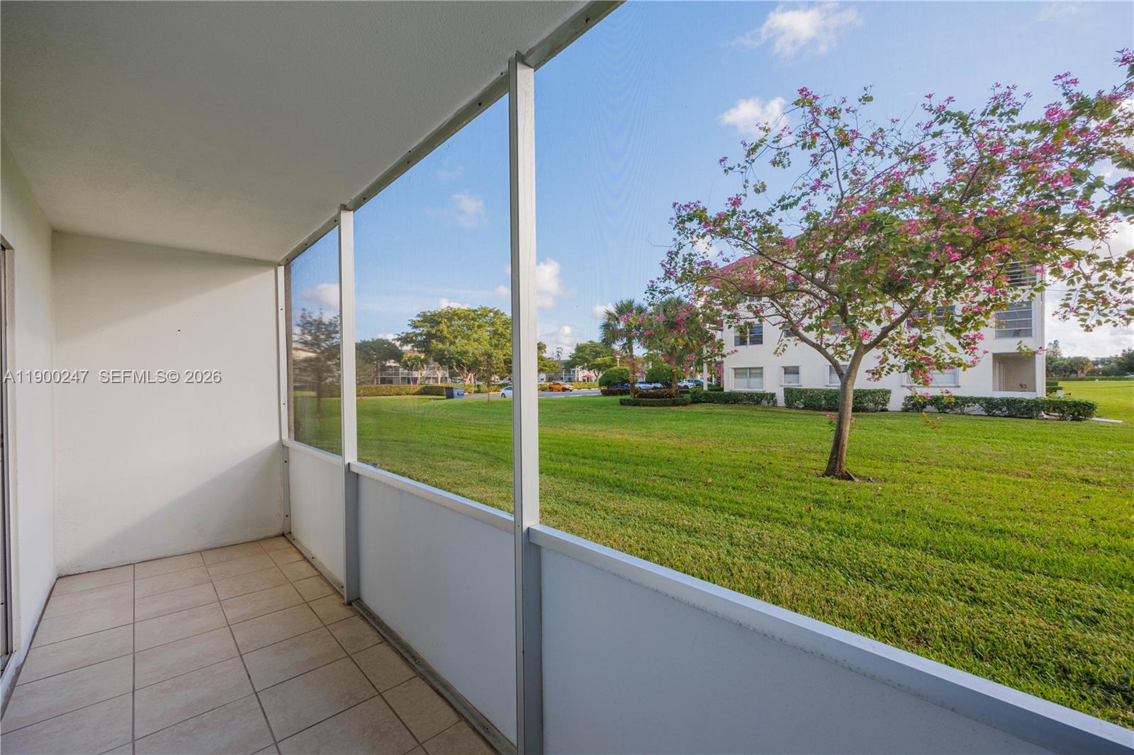 303 Preston H, Unit 303 Boca Raton, FL 33434 - Photo 25 of 50 a view of a garden with an empty space