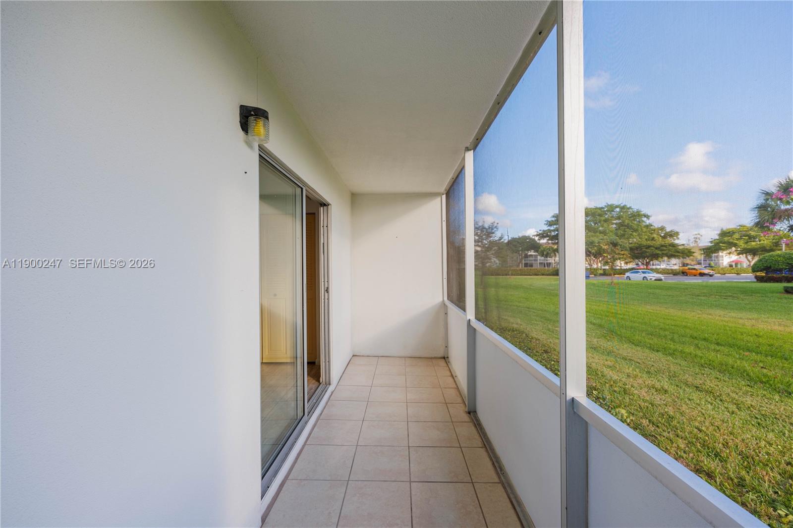 303 Preston H, Unit 303 Boca Raton, FL 33434 - Photo 27 of 50 a view of balcony with yard
