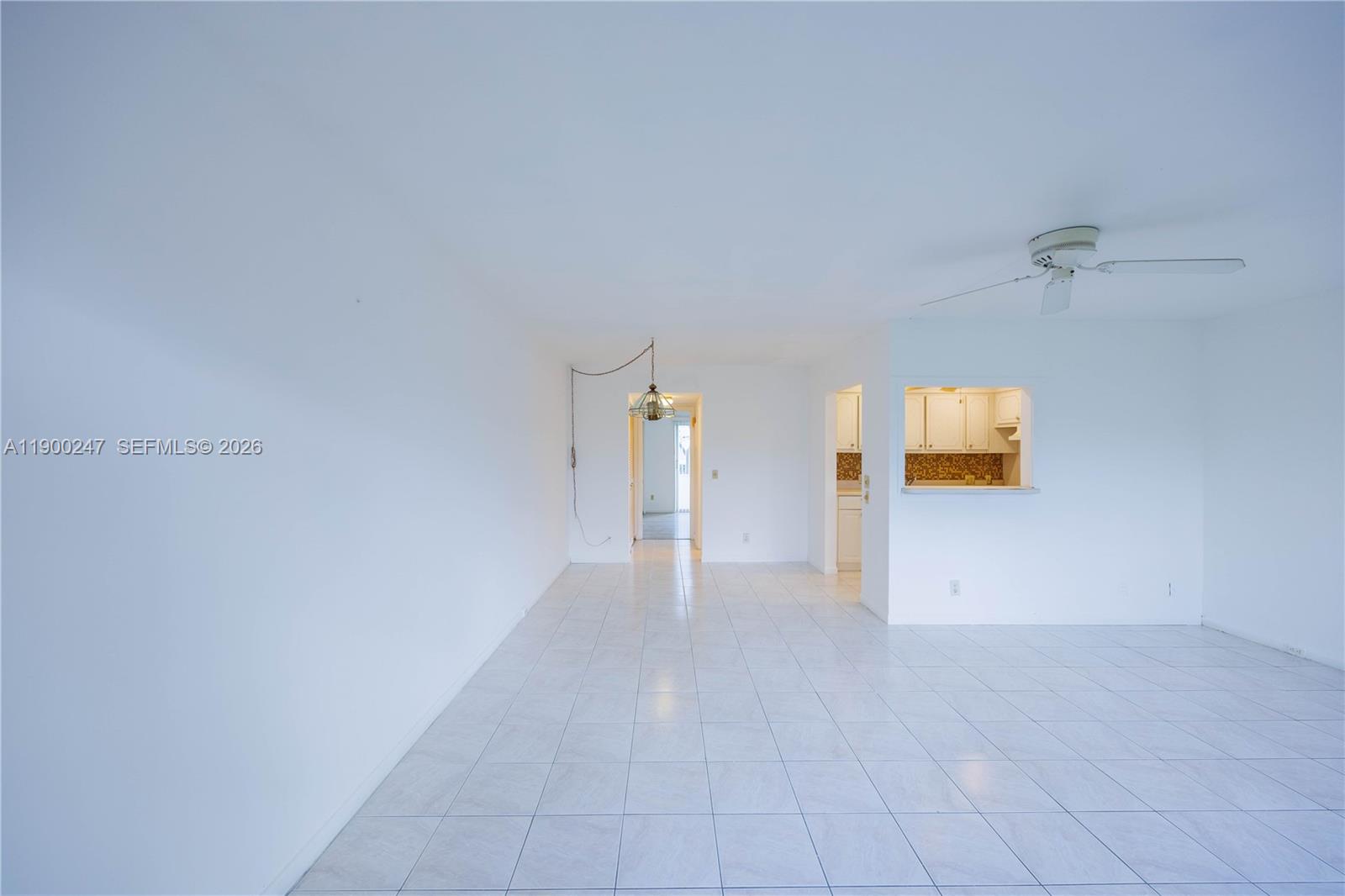 303 Preston H, Unit 303 Boca Raton, FL 33434 - Photo 3 of 50 a view of a room with wooden floor