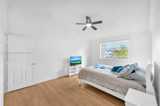 a bedroom with a bed and furniture