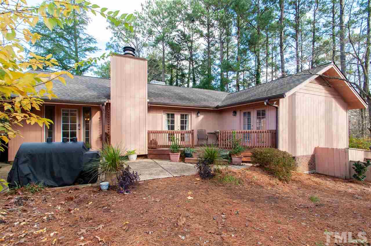2712 Rue Sans Famille Raleigh, NC 27607 - Photo 1 of 28 a front view of a house with patio