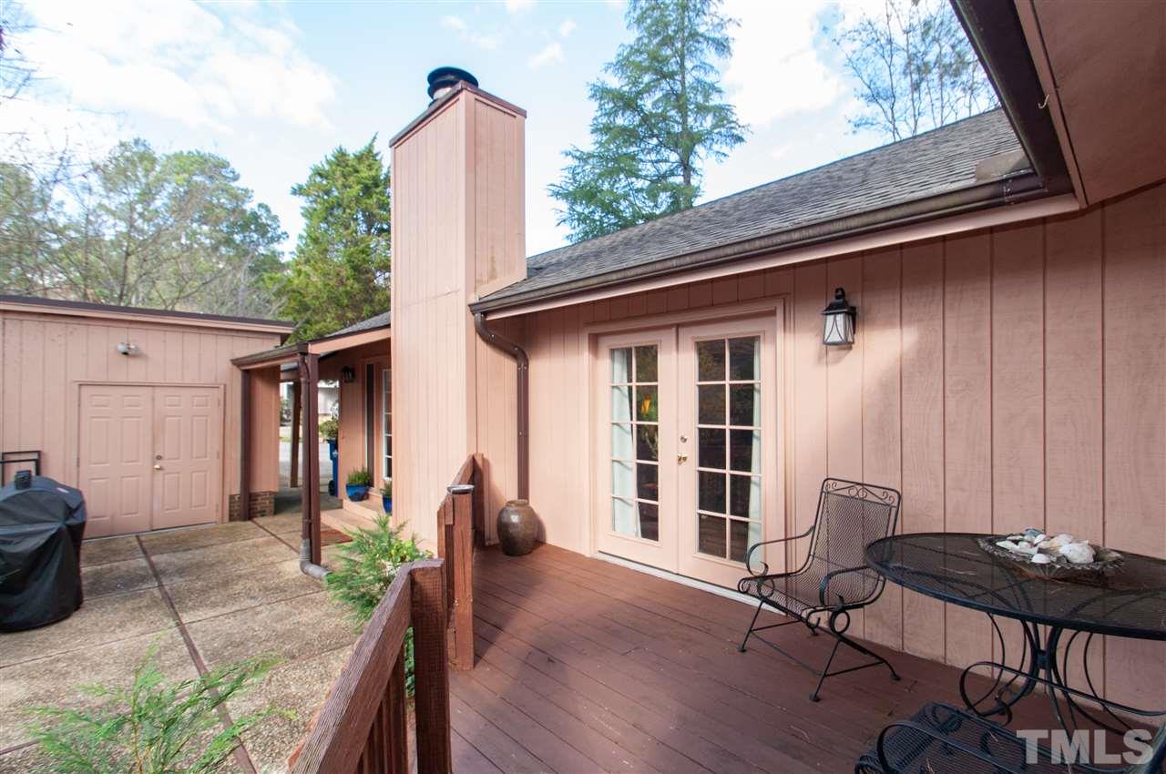 2712 Rue Sans Famille Raleigh, NC 27607 - Photo 22 of 28 a backyard of a house with seating space