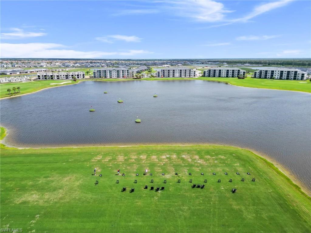 5583 Double Eagle Circle, Unit 4126 Ave Maria, FL 34142 - Photo 14 of 29 a view of an ocean and a mountain