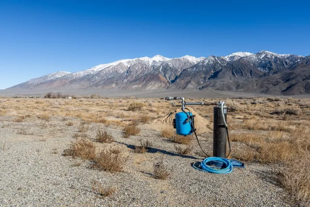 a view of ocean and mountain