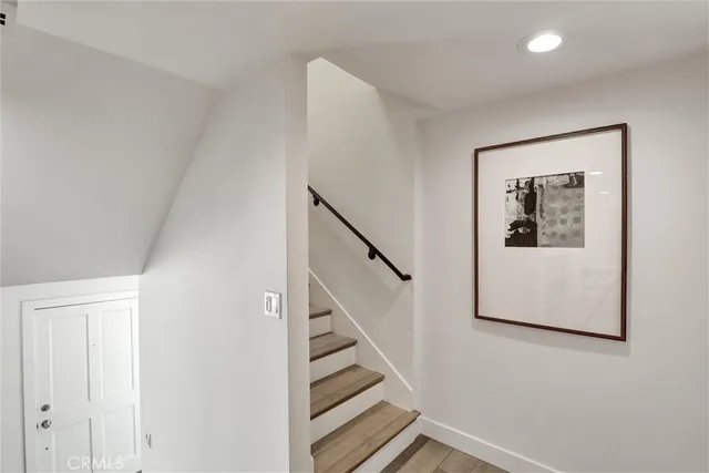 a view of a hallway with staircase