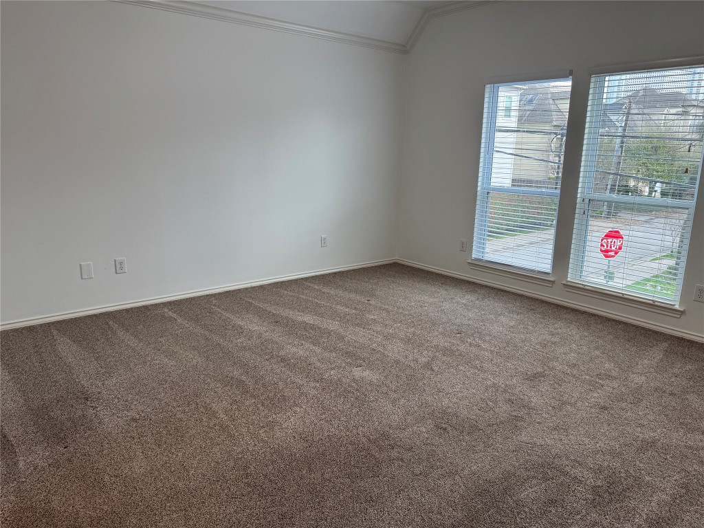 1908 Bailey Street Houston, TX 77006 - Photo 23 of 40 Here's the primary bedroom. It's at the front of the house and has downtown skyline views.