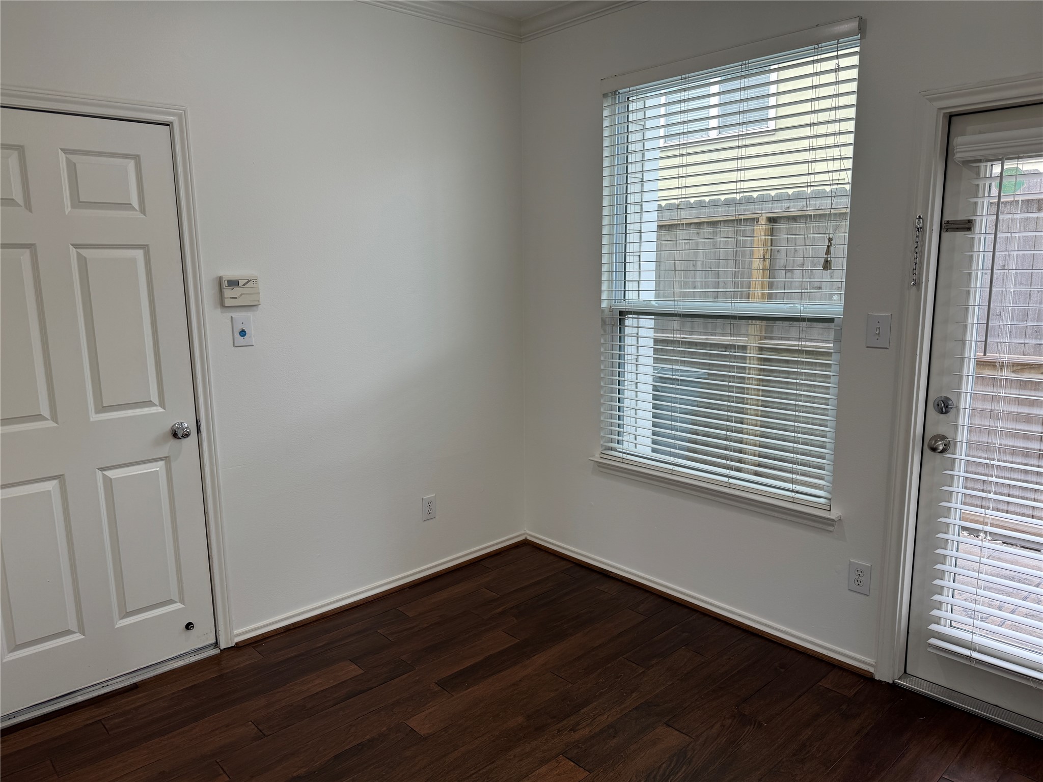 1908 Bailey Street Houston, TX 77006 - Photo 6 of 40 Here's the dining area and the door to your 1-car garage. The garage has an automatic opener and shelves to store your totes along the ceiling.