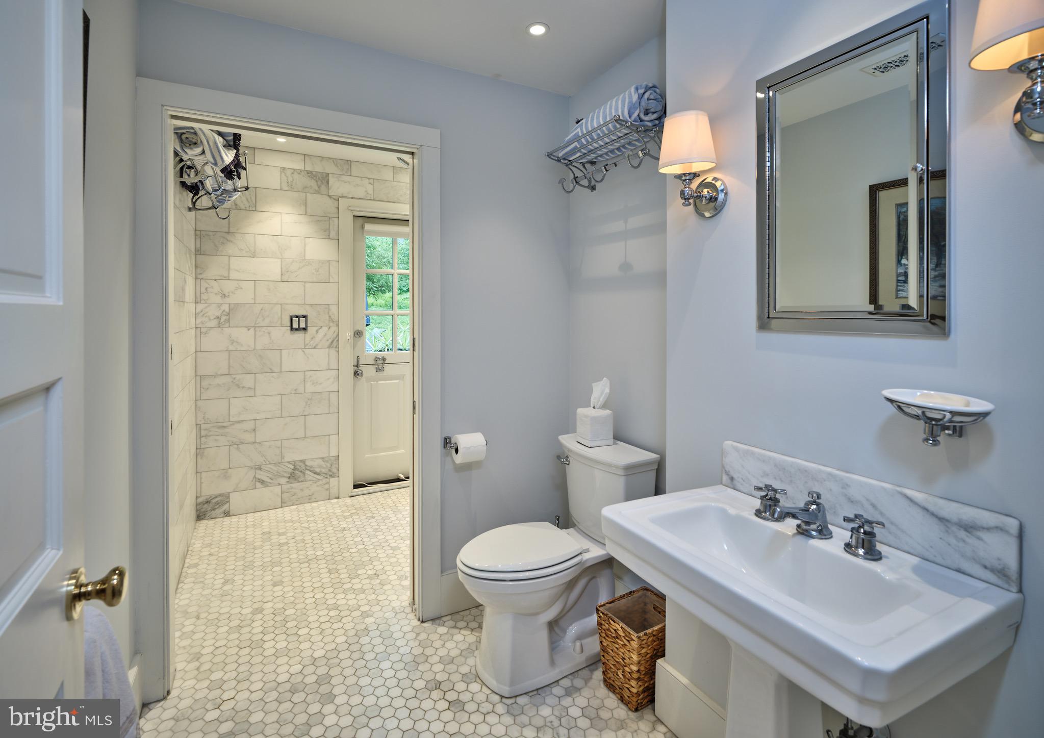 3363 Windy Bush Road New Hope, PA 18938 - Photo 29 of 40 Second shared hall bathroom with backyard access