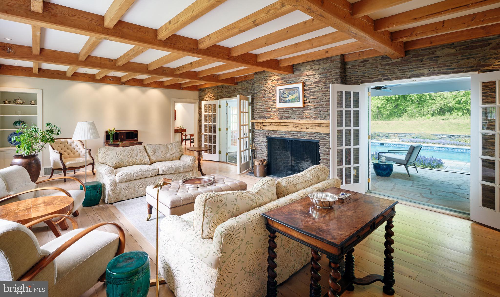 3363 Windy Bush Road New Hope, PA 18938 - Photo 4 of 40 Living room with exposed beams