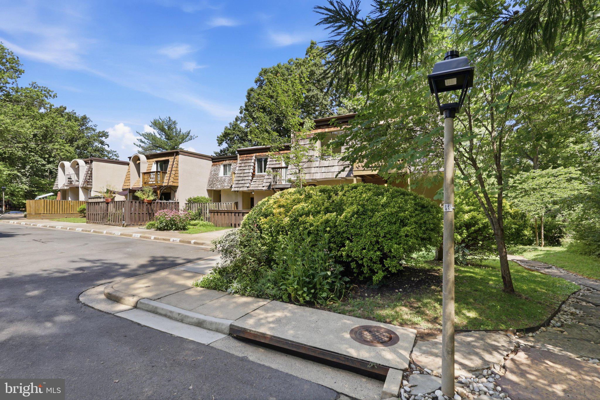 1651 Valencia Way Reston, VA 20190 - Photo 4 of 66 End-Unit TH surrounded by trees!