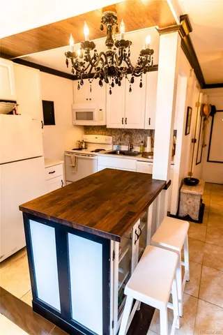 a spacious bathroom with a sink and a mirror