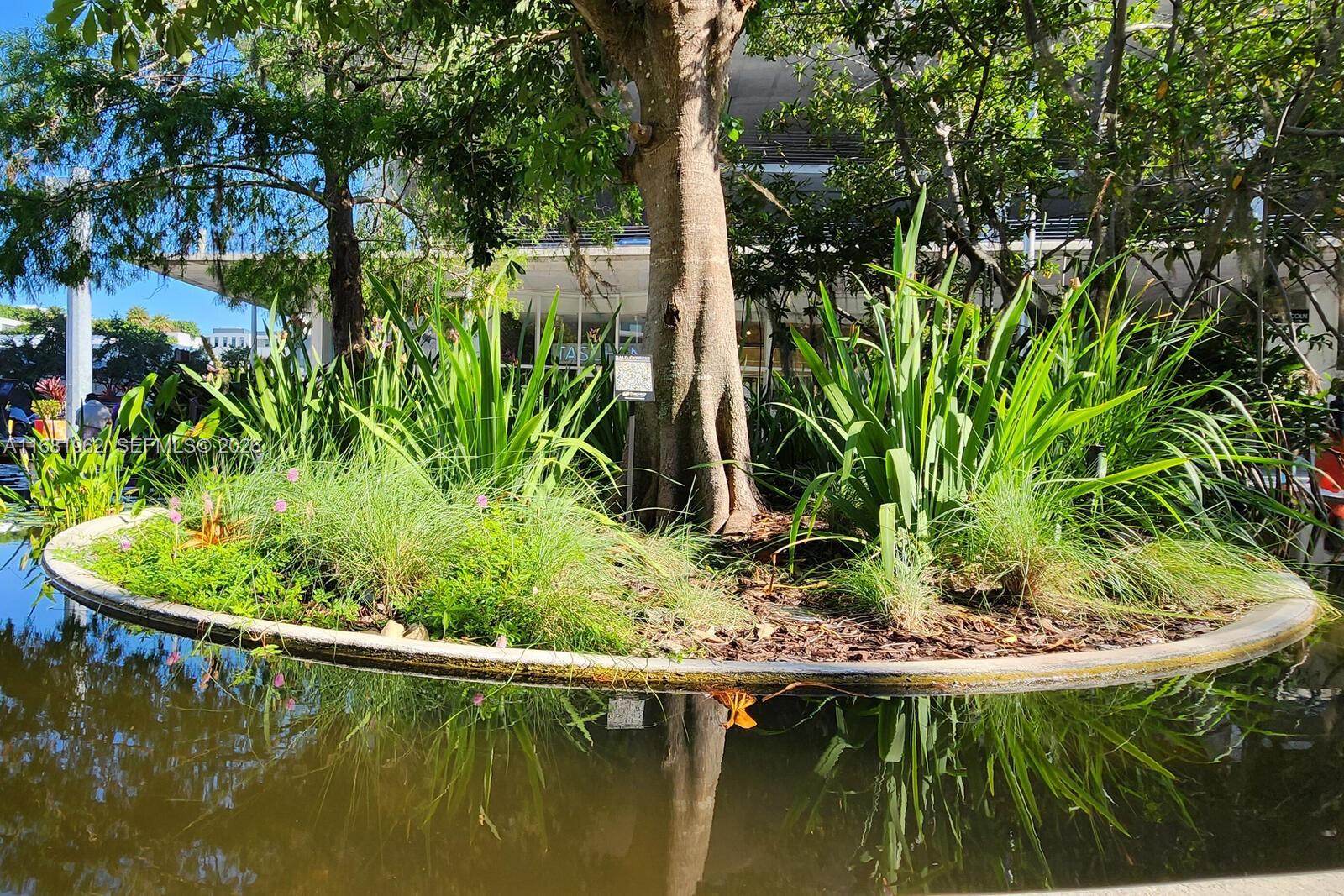 1300 Lincoln Road, Unit A701 Miami Beach, FL 33139 - Photo 33 of 36 a view of swimming pool from a lake view