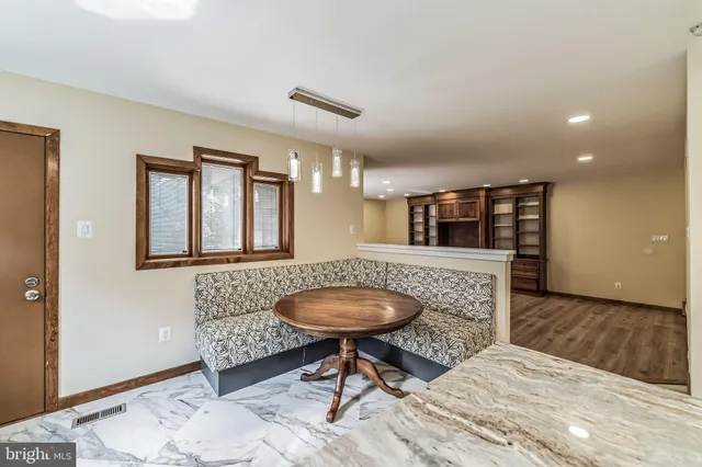 a view of a livingroom with furniture and window