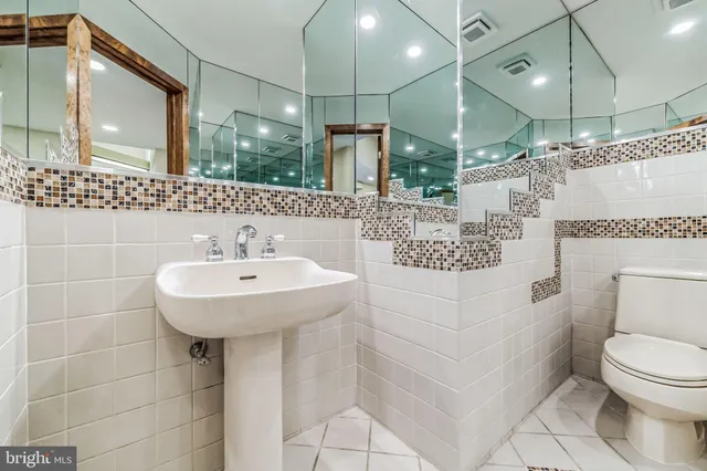 a view of an empty room and wooden floor