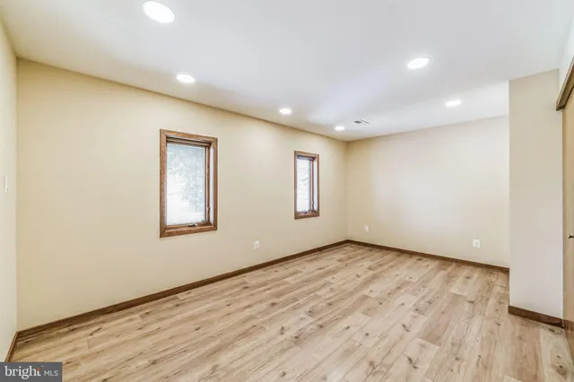 a bathroom with a bathtub and a sink