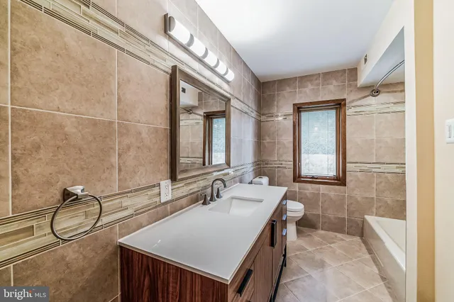 a bathroom with a bathtub