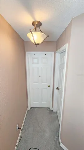 a kitchen with kitchen island a sink appliances and cabinets