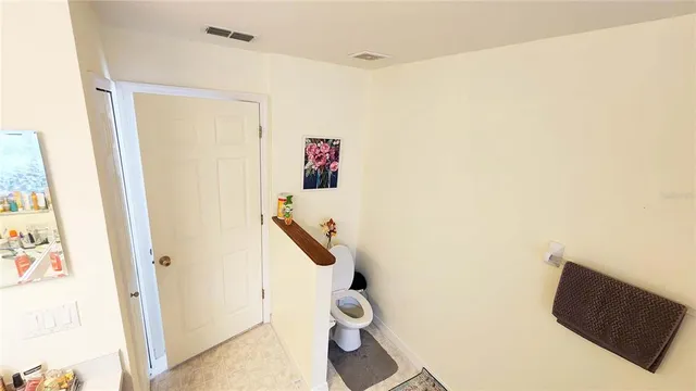 a bathroom with a shower and a sink