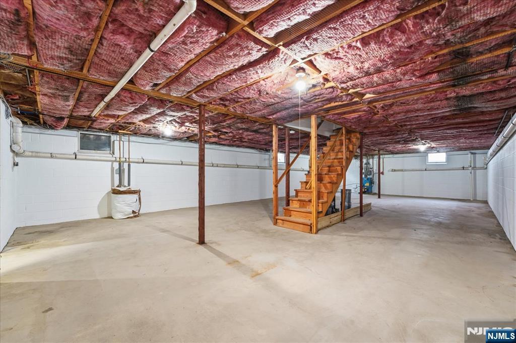 611 Snake Den Road West Milford, NJ 07480 - Photo 35 of 46 a view of empty room with wooden ceiling