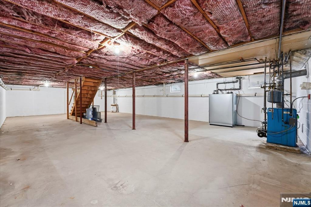 611 Snake Den Road West Milford, NJ 07480 - Photo 36 of 46 a view of empty room with wooden ceiling