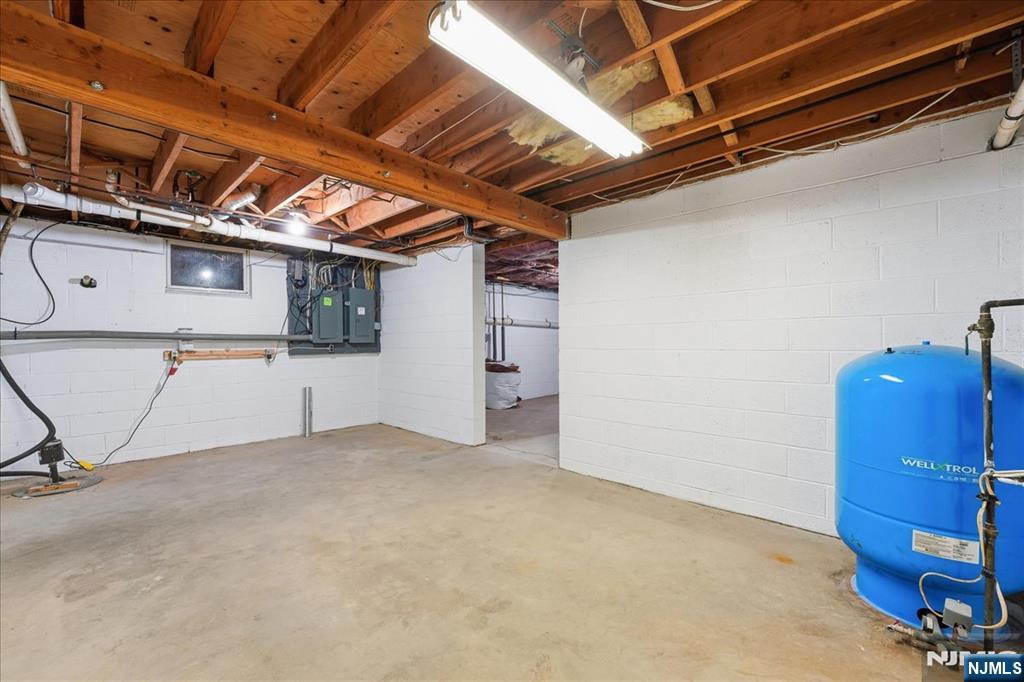 611 Snake Den Road West Milford, NJ 07480 - Photo 37 of 46 a view of a room with gym equipment