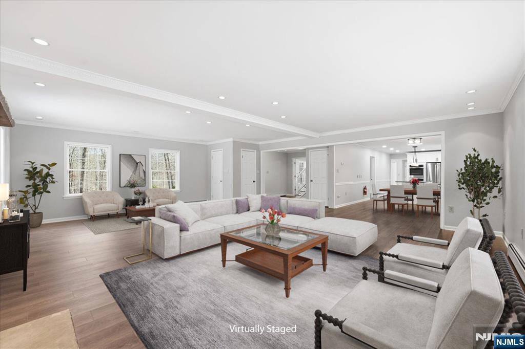 611 Snake Den Road West Milford, NJ 07480 - Photo 9 of 46 a living room with furniture and wooden floor