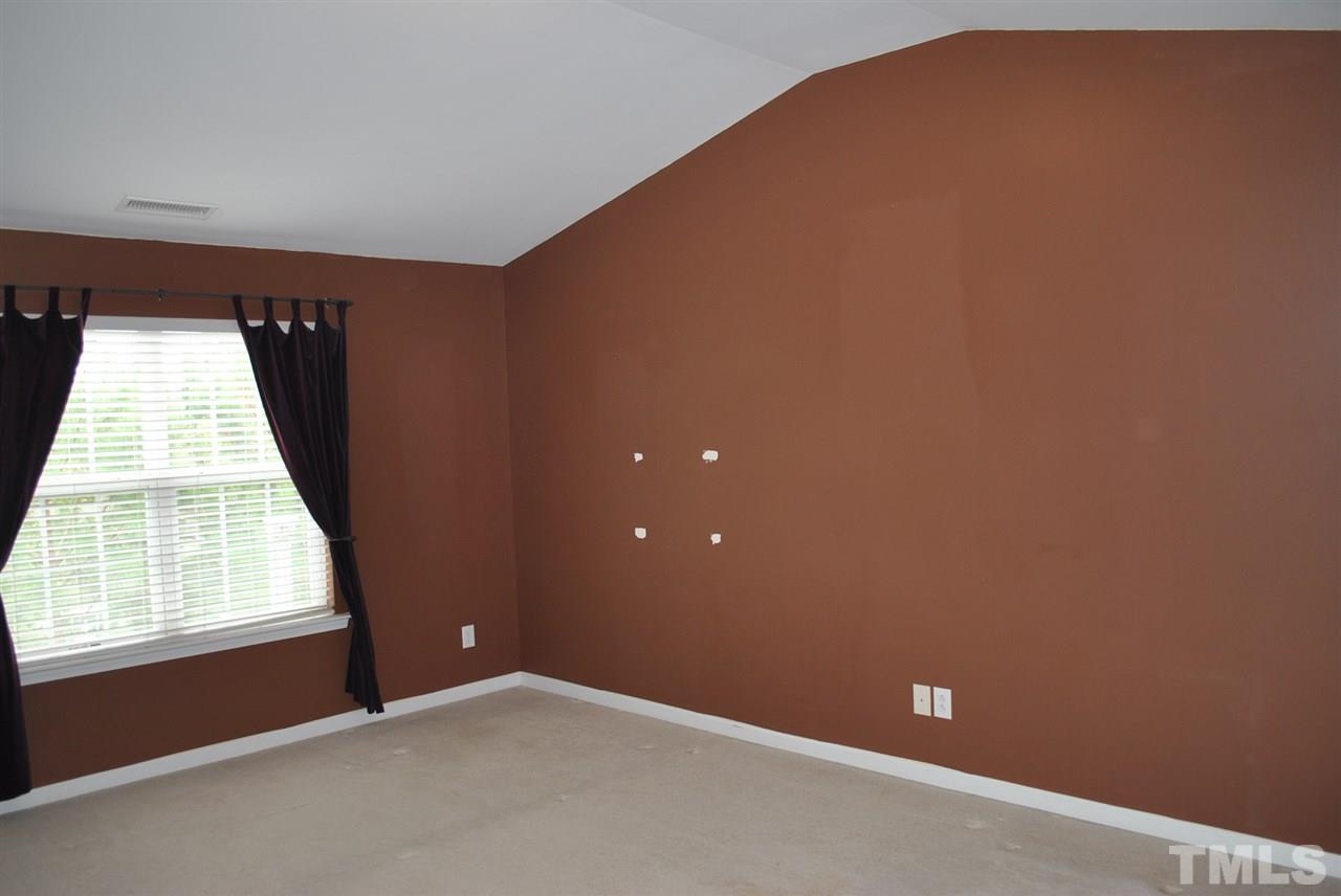 8234 Belneath Court Raleigh, NC 27613 - Photo 11 of 20 an empty room with windows