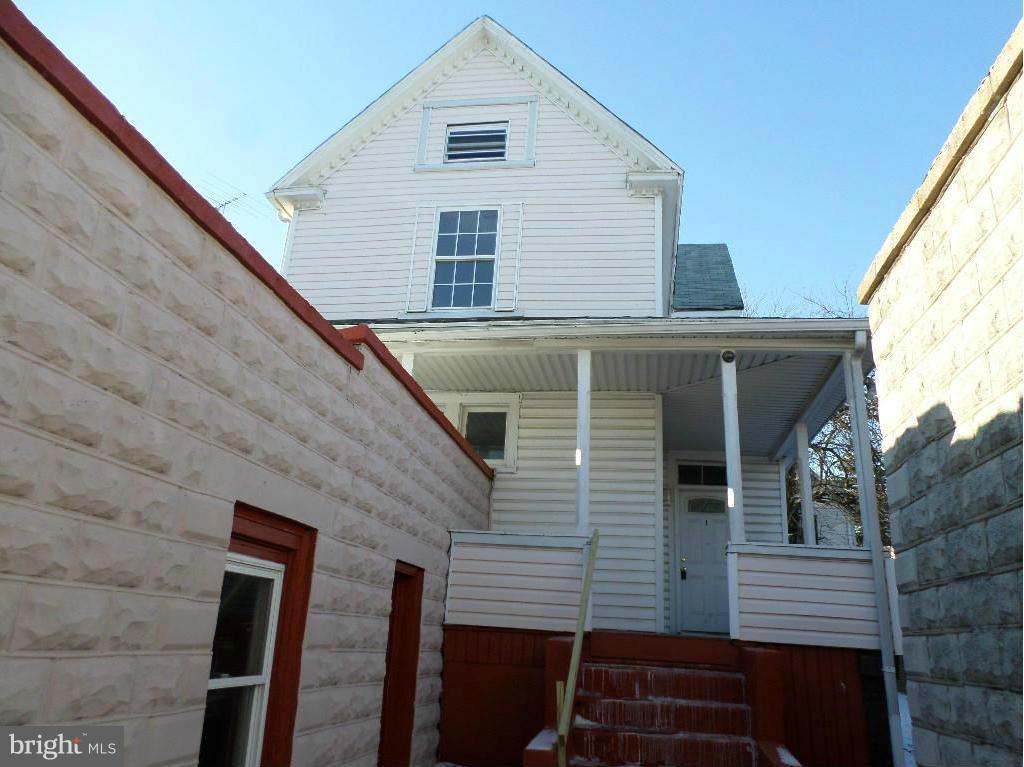 4534 Harford Road Baltimore, MD 21214 - Photo 1 of 18 a view of a house with a door