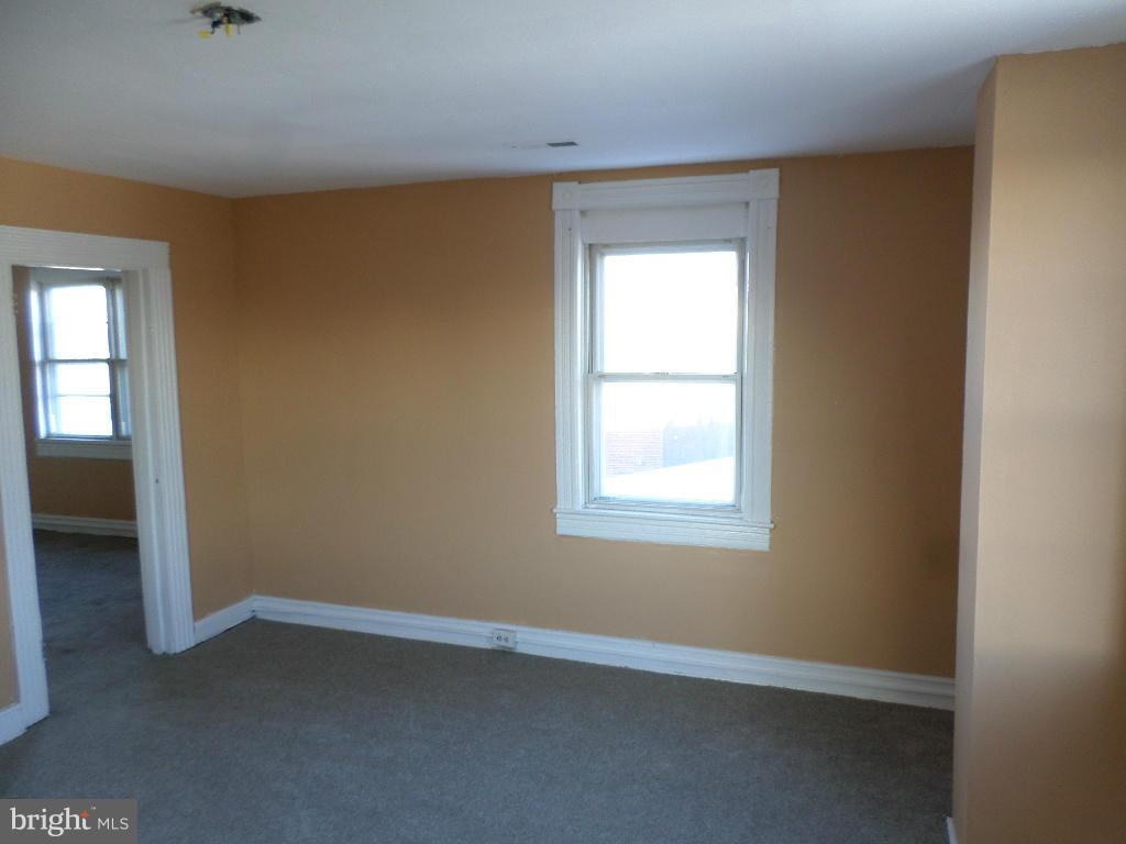 4534 Harford Road Baltimore, MD 21214 - Photo 16 of 18 an empty room with a window