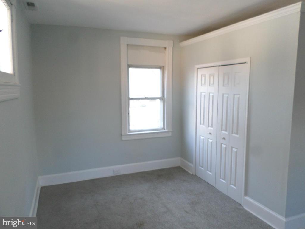 4534 Harford Road Baltimore, MD 21214 - Photo 17 of 18 an empty room with a window
