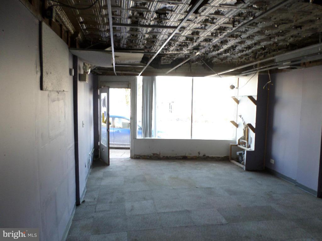 4534 Harford Road Baltimore, MD 21214 - Photo 3 of 18 a view of empty room with large windows