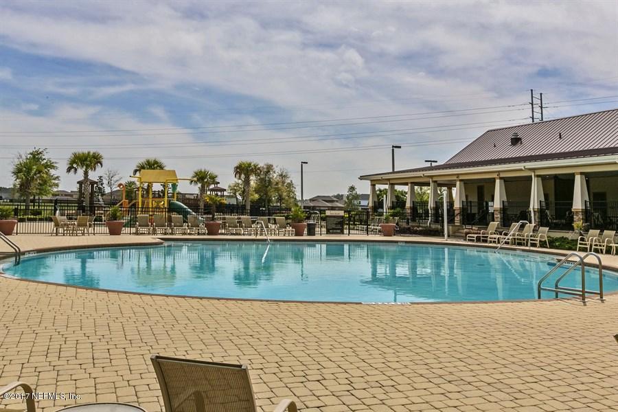 16365 Tisons Bluff Road Jacksonville, FL 32218 - Photo 16 of 25 a view of swimming pool with outdoor seating