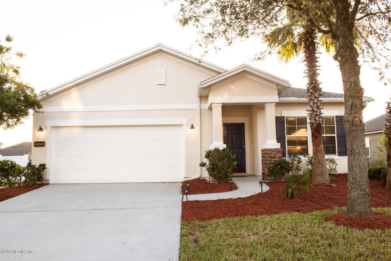 16365 Tisons Bluff Road Jacksonville, FL 32218 - Photo 20 of 25 a view of a house with brick walls and potted plants