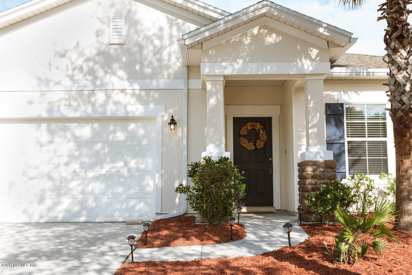 16365 Tisons Bluff Road Jacksonville, FL 32218 - Photo 2 of 25 a view of a house with potted plants