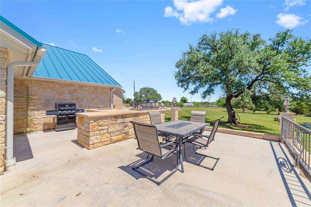 3612 Highway 1689 Comanche, TX 76442 - Photo 24 of 30 View of patio with outdoor dining area and area for grilling