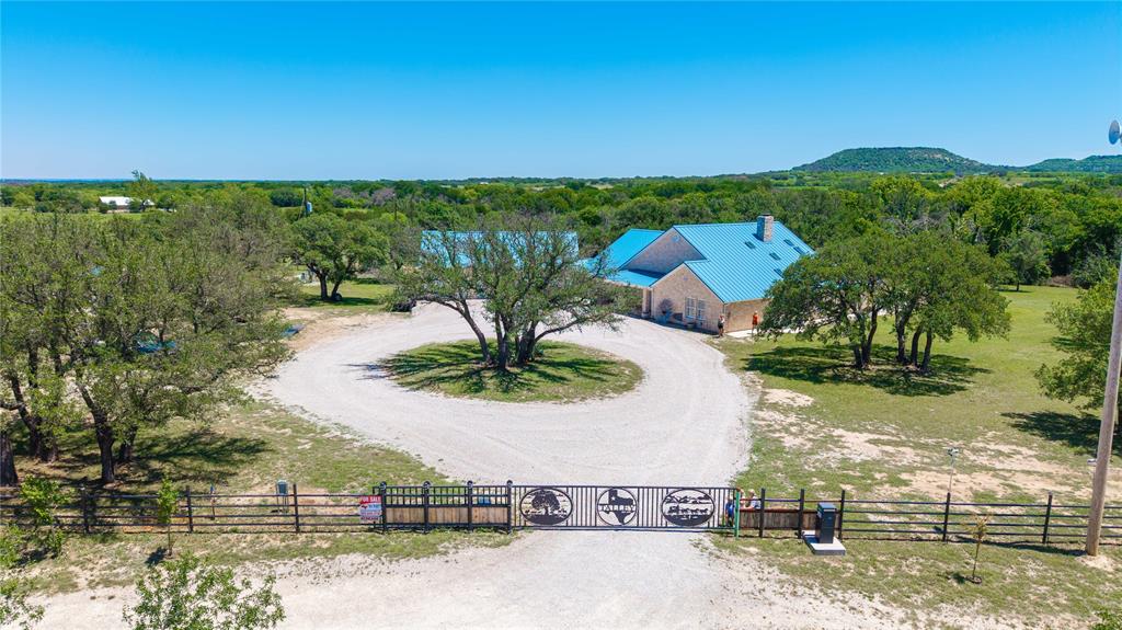 3612 Highway 1689 Comanche, TX 76442 - Photo 6 of 30 Aerial view of property and surrounding area featuring a mountainous background