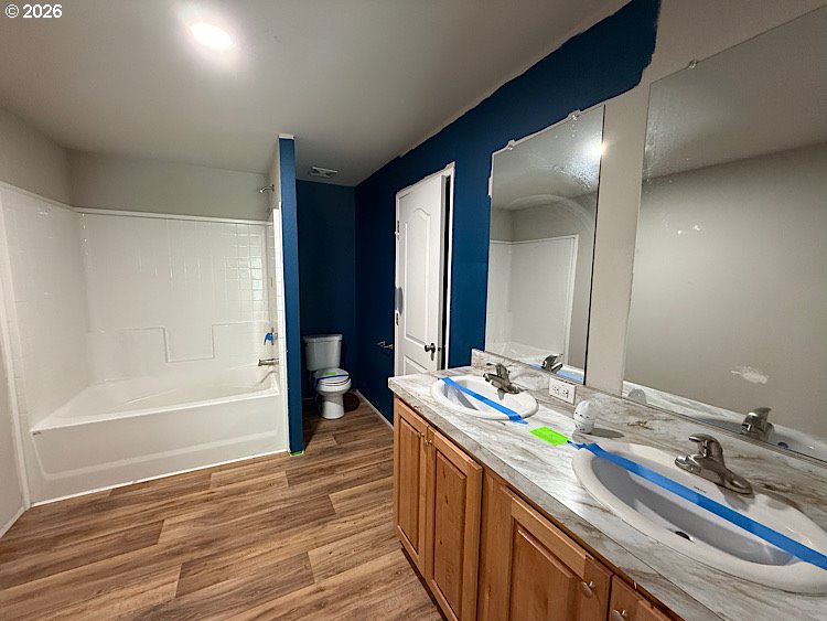 16125 Hawks Lair Road La Pine, OR 97739 - Photo 6 of 35 a bathroom with a double vanity sink and a mirror