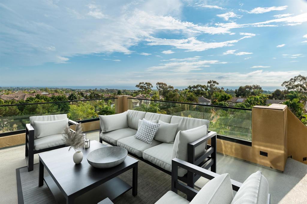 6768 Strawberry Place Carlsbad, CA 92011 - Photo 30 of 53 a view of a terrace with couches and a table