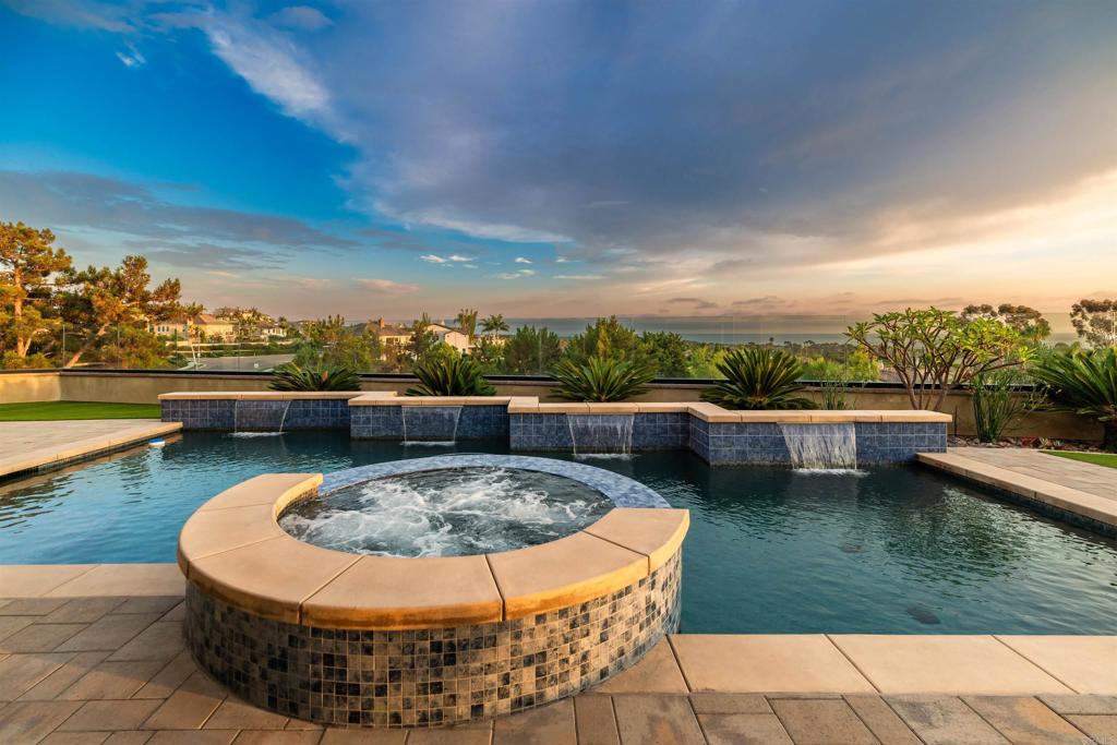 6768 Strawberry Place Carlsbad, CA 92011 - Photo 42 of 53 a view of a lake with a city