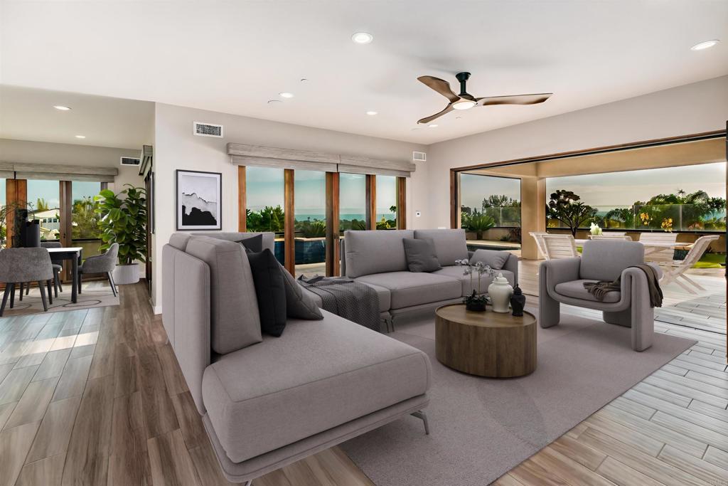 6768 Strawberry Place Carlsbad, CA 92011 - Photo 10 of 53 a living room with furniture and a large window